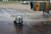 apron-being-cleaned-in-front-aircraft-jetty-airbridge-on-stand-at-AEP-aeroparque-jorge-newbery-capital-federal-buenos-aires-republic-argentina-south-america