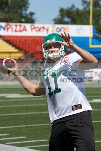 cfl roughrider player throwing ball