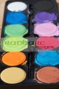 close-up-mixed-used-childs-watercolour-paints-palette