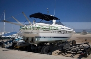 sunseeker-motor-cruiser-yacht-on-trailer-for-servicing-maintenance-in-the-harbour-in-latchi-village-in-the-polis-municipality-republic-cyprus-europe