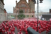 Over-10000-people-dressed-as-santa-claus-attempt-the-Guinness-World-Record-in-guildhall-square-with-cannon-Derry-Northern-Ireland