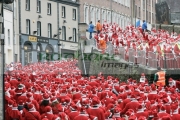 DERRY,-UNITED-KINGDOM-_-DECEMBER-09:-atmosphere.-Over-10000-people-dressed-as-santa-claus-attempt-the-Guinness-World-Record-in-Derry-Northern-Ireland-