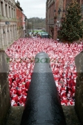 DERRY,-UNITED-KINGDOM-_-DECEMBER-09:-atmosphere.-Over-10000-people-dressed-as-santa-claus-attempt-the-Guinness-World-Record-in-Derry-Northern-Ireland-