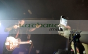 woman-uses-iphone-to-video-from-the-front-row-at-theTyler-Ward-gig-at-the-Speakeasy-Queens-University-Belfast-Students-Union-Sunday-26th-February-2012