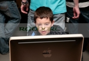 BELFAST,-UNITED-KINGDOM-_-SEPTEMBER-20:-9-year-old-Ewan-Latimer-who-travelled-the-70-miles-from-Derry-to-be-one-the-first-in-the-queue-at-the-Apple-Store-opening-in-Victoria-Square-on-September-19,-2008-in-Belfast,-Northern-Ireland-
