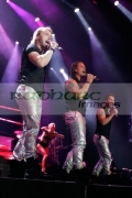 BELFAST,-UNITED-KINGDOM-_-MAY-25:-Ronan-Keating,-Keith-Duffy-Stephen-Gately-perform-with-Boyzone-at-the-Odyssey-Arena,-Belfast