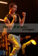 BELFAST,-UNITED-KINGDOM-_-MAY-25:-Stephen-Gately-performs-with-Boyzone-at-the-Odyssey-Arena,-Belfast