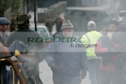 Sir-Richard-Attenborough-centre-on-the-set-Closing-the-Ring,-Belfast,-Northern-Ireland.