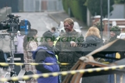actor-playing-British-soldier-takes-break-on-the-set-Closing-the-Ring,-Belfast,-Northern-Ireland.