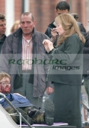 Pete-Postlethwaite-Shirley-MacLaine-on-location-for-Sir-Richard-Attenboroughs-latest-film-Closing-the-Ring-in-Belfast,-Northern-Ireland.