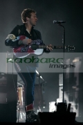 BELFAST,-UNITED-KINGDOM-_-DECEMBER-19:-Chris-Martin-Coldplay-performs-at-Odyssey-Arena-on-December-19,-2008-in-Belfast,-Northern-Ireland.