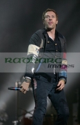BELFAST,-UNITED-KINGDOM-_-DECEMBER-19:-Chris-Martin-Coldplay-performs-at-Odyssey-Arena-on-December-19,-2008-in-Belfast,-Northern-Ireland.