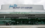 Belfast-City-Airports-new-logo-at-George-Best-airport-renaming-ceremony,-Belfast-City-Airport,-Belfast,-Northern-Ireland.