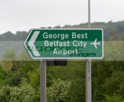 New-roadsigns-bearing-George-Bests-name,-Belfast-City-Airport,-Belfast,-Northern-Ireland.