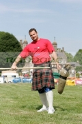 Gregor-Edmunds-from-Scotland-at-the-Glenarm-Castle-International-Highland-Games-USA-v-Europe,-Glenarm,-County-Antrim,-Northern-Ireland.