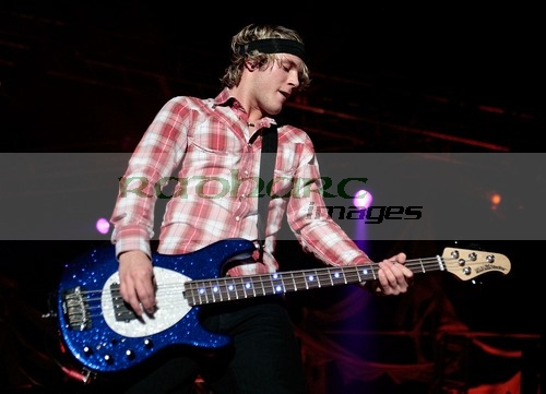 BELFAST,-UNITED-KINGDOM-_-NOVEMBER-10:-Dougie-Poynter-McFly-performs-at-Odyssey-Arena-on-November-10,-2008-in-Belfast,-Northern-Ireland