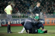 keith-gillespie-lies-injured-receiving-treatment-at-an-international-friendly-football-match-between-Northern-Ireland-Wales-at-Windsor-Park-6th-February-2006