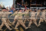 Royal-Irish-Regiment-soldiers-walk-past-loyalist-supporters-at-the-Royal-Irish-Regiment-RIR-Homecoming-Parade-in-Belfast-on-September-02,-2008-in-Belfast,-Northern-Ireland.-The-parade,-which-passed-relatively-peacefully,-was-for-troops-returning-from-Iraq-Afghanistan.