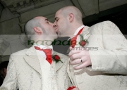 Christopher-Flanaghan-Henry-Kane-after-their-gay-wedding-ceremony-under-the-UKs-new-civil-partnership-laws,-Belfast-City-Hall,-Belfast,-Northern-Ireland