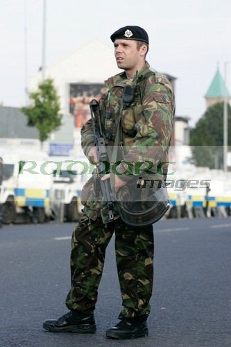 armed british soldier on uk street
