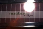 sun-shining-on-cells-solar-recharging-panel-on-small-electrical-device