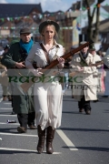 reinactors-dressed-in-period-costume-representing-an-IRA-flying-column-marching-on-Easter-Sunday-at-the-Easter-Rising-Commemoration-Falls-Road-Belfast-Northern-Ireland-UK