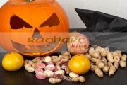 the-spoils-from-trick-or-treating-with-halloween-pumpkin-jack_o_lantern.-Traditionally-in-Ireland-turnips-or-swedes-were-used-to-create-the-lanterns-irish-immigrants-in-america-used-pumpkins-instead.