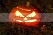 illuminated-halloween-pumpkin-jack_o_lantern-on-grass-at-night