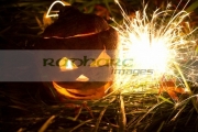 illuminated-halloween-turnip-jack_o_lantern-with-sparkler-to-ward-off-evil-spirits.-Traditionally-in-Ireland-turnips-or-swedes-were-used-to-create-the-lanterns-irish-immigrants-in-america-used-pumpkins-instead.