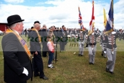 loyal-orange-lodge-orangemen-watching-parade-loyalist-band-leave-the-field-during-12th-July-Orangefest-celebrations-in-Dromara-county-down-northern-ireland
