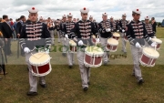 members-loyalist-drum-flute-band-marching-from-the-field-in-uniform-during-12th-July-Orangefest-celebrations-in-Dromara-county-down-northern-ireland