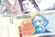 argentinian-pesos-british-pound-banknotes