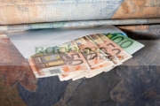 hiding-euros-cash-in-an-envelope-under-the-mattress