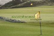 hole-flag-pole-on-green-on-an-irish-links-golf-course