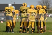 Irish-American-Football-League-Carrickfergus-knights-huddle-before-game-v-University-Limerick-Vikings,-Carrickfergus-25th-April-2004