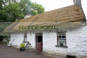 loop-head-house-for-fishermen-with-tied-down-thatched-roof-cottage-Bunratty-Folk-Park,-County-Clare,-Republic-Ireland