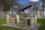 crimean-war-cannon-trophy-with-wallace-memorial-in-the-background-in-castle-gardens-in-lisburn-city-centre-county-antrim-northern-ireland-uk