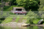 red-ford-estate-car-parked-at-the-top-old-slipway-with-new-wooden-jetty-old-rowing-boat