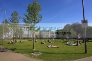 people-enjoying-the-sunshine-on-the-green-Eyre-Square-in-the-heart-Galway-city-county-Galway-Republic-Ireland