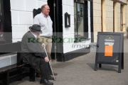 two-old-irish-men-outside-pub-strand-street-in-An-Daingean-dingle-town-europes-most-westerly-town-on-the-dingle-peninsula-county-kerry-republic-ireland
