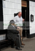two-old-irish-men-outside-pub-strand-street-in-An-Daingean-dingle-town-europes-most-westerly-town-on-the-dingle-peninsula-county-kerry-republic-ireland