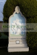 simon-cyrene-carries-the-cross-the-5th-station-the-cross-with-irish-gaelic-writing-at-knock-marian-shrine-county-mayo-republic-ireland