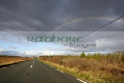 rainbow-over-road-through-bogland-open-rough-ground-in-county-mayo-republic-ireland