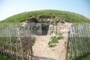 small-neolithic-passage-tomb-known-as-the-mound-the-hostages-on-the-hill-tara-teamhair-na-ri-hill-the-king-archaeological-complex-in-county-meath-republic-ireland