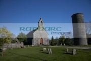 remains-St-Diags-monastery-round-tower-in-the-grounds-St-Marys-church-cemetary-in-inniskeen-county-monaghan-republic-ireland-eire