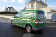 green-an-post-irish-postal-service-delivery-van-in-small-rural-town-enniscrone-county-sligo-republic-ireland