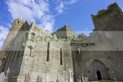 remains-13th-century-cathedral-against-blue-cloudy-sky-in-the-Rock-Cashel,-Cashel,-County-Tipperary,-Republic-Ireland