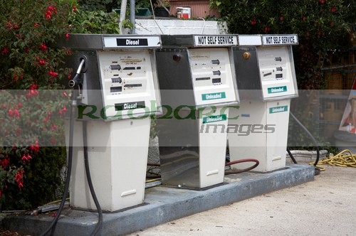 row-traditional-petrol-diesel-pumps-on-old-forecourt-shop-in-courtown-not-self-service