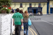 tourists-walk-towards-fitzgeralds-pub-in-the-village-avoca-from-the-tv-series-ballykissangel