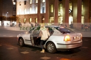 female-shopper-gets-into-taxi-on-oconnell-street-dublin-republic-ireland